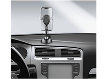 Charger l&#39;image dans la galerie, Un support de téléphone de voiture avec un téléphone attaché, monté sur le tableau de bord d&#39;une voiture.
