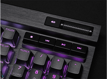 Charger l&#39;image dans la galerie, Gros plan sur un clavier noir avec éclairage violet et boutons multimédias.
