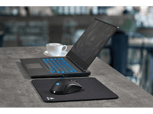 Charger l&#39;image dans la galerie, Ordinateur portable noir avec clavier éclairé en bleu et souris sur un bureau.
