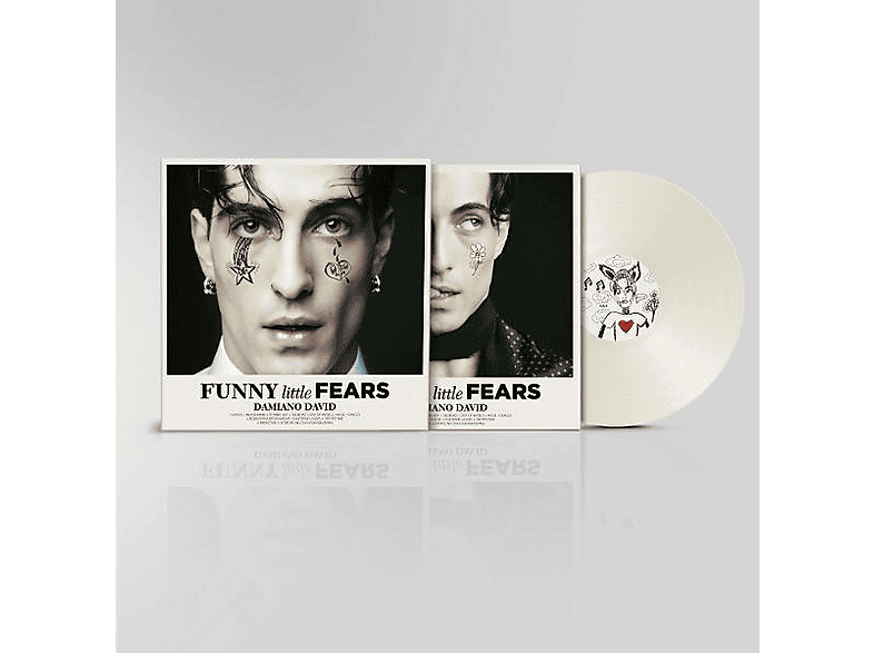 Pochette d'album montrant un homme avec des tatouages sur le visage et un disque vinyle.