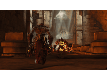 Charger l&#39;image dans la galerie, Un guerrier face à deux monstres de lave dans un couloir de pierre. La lumière tamisée crée des ombres et mystère.
