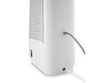 Charger l&#39;image dans la galerie, Déshumidificateur blanc avec tube gris. L&#39;appareil a une grille et un trou de drainage.
