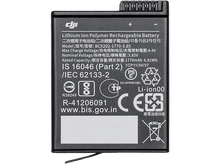 Charger l&#39;image dans la galerie, Une petite batterie DJI rectangulaire avec du texte et des symboles imprimés sur sa surface.

