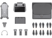 Charger l&#39;image dans la galerie, Un kit de drone avec divers composants : corps du drone, télécommande, sac, hélices, batteries et accessoires.
