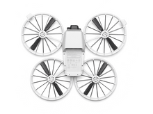 Charger l&#39;image dans la galerie, Drone blanc avec quatre hélices, vu d&#39;en bas, sur une surface blanche.
