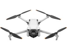 Charger l&#39;image dans la galerie, Drone blanc avec hélices noires sur fond noir.
