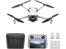 Charger l&#39;image dans la galerie, Drone DJI Mini 3 blanc avec accessoires : contrôleur, batterie et étui de transport.
