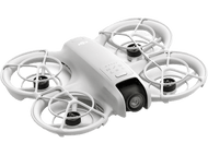 Drone blanc avec quatre hélices sur fond noir. Le mot DJI est en haut.