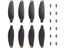 Charger l&#39;image dans la galerie, Ensemble de huit hélices de drone noires avec des pointes oranges, à côté des vis.
