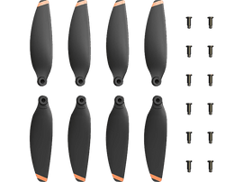 Ensemble de huit hélices de drone noires avec des pointes oranges, à côté des vis.