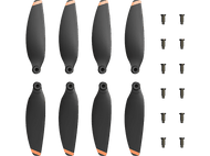 Ensemble de huit hélices de drone noires avec des pointes oranges, à côté des vis.