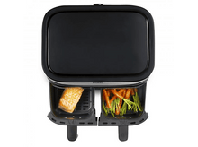 Charger l&#39;image dans la galerie, Une friteuse à air ouverte avec deux compartiments contenant du saumon et des carottes.
