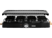 Charger l&#39;image dans la galerie, Un grill à raclette noir avec une base en bois. Il possède un bouton de commande et des plateaux noirs.
