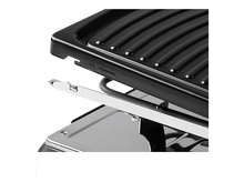 Charger l&#39;image dans la galerie, Gros plan d&#39;un grill noir avec un élément chauffant visible. Le levier argenté pointe vers la flèche.
