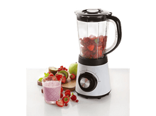 Charger l&#39;image dans la galerie, Mixeur rempli de fraises, de kiwi et un verre de smoothie rose.
