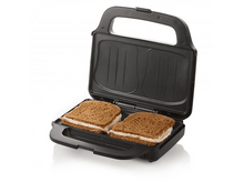 Charger l&#39;image dans la galerie, Appareil à sandwich noir avec deux sandwichs à l&#39;intérieur, sur fond blanc.
