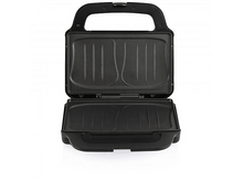 Charger l&#39;image dans la galerie, Une presse à panini ouverte avec deux zones de cuisson. Elle est noire et a une poignée en haut.
