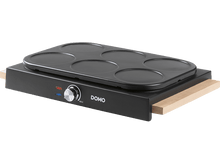 Charger l'image dans la galerie, Machine à crêpes noire avec six moules circulaires sur une base en bois.
