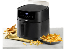 Charger l'image dans la galerie, Friteuse à air noire avec frites et sauce sur une table, sur fond clair.
