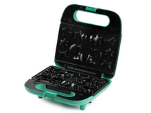 Charger l'image dans la galerie, Un gaufrier ouvert avec différentes formes.
