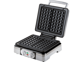 Un gaufrier ouvert, intérieur noir et extérieur argenté, prêt à l