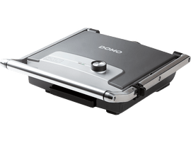 Un grill DOMO argenté et noir. Le grill est fermé et possède un bouton de commande.