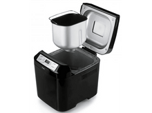 Charger l&#39;image dans la galerie, Machine à pain noire, dessus ouvert avec le récipient retiré.
