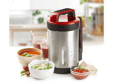 Charger l&#39;image dans la galerie, Un blender rouge et argenté avec des aliments devant.
