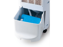 Charger l'image dans la galerie, Un refroidisseur blanc avec un bac à glace bleu dans un compartiment.
