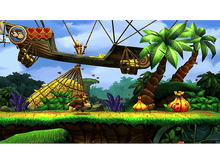 Charger l'image dans la galerie, Donkey Kong courant dans une scène de jungle avec des bananes.
