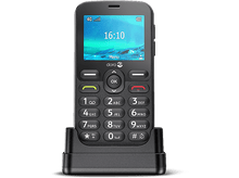 Charger l&#39;image dans la galerie, Téléphone Doro noir sur un socle de chargement, avec un écran affichant l&#39;heure et les barres de signal. Boutons visibles.
