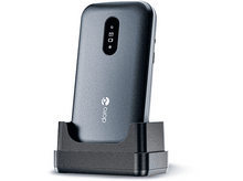 Charger l&#39;image dans la galerie, Un téléphone bleu foncé dans un socle de chargement noir, avec le logo Doro.
