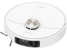 Charger l&#39;image dans la galerie, Femme monte un scooter noir sur une route pavée, château en arrière-plan.
