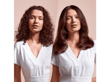 Charger l&#39;image dans la galerie, Deux femmes, une avec des cheveux bouclés et une avec des cheveux lissés, toutes deux en hauts blancs.
