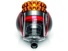 Charger l&#39;image dans la galerie, Un aspirateur Dyson avec un corps argenté, des accents rouges et un dessus doré.

