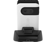 Charger l&#39;image dans la galerie, Un appareil blanc et noir sur une base noire, avec un bouton et un port USB.
