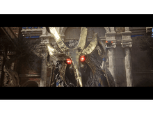 Charger l&#39;image dans la galerie, Gros plan d&#39;un masque doré orné avec des yeux rouges brillants, devant une structure en pierre antique.
