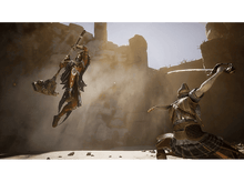 Charger l&#39;image dans la galerie, Deux guerriers combattent dans un environnement désertique. Un saute.
