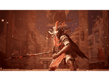 Charger l&#39;image dans la galerie, Une figure costumée avec un bâton dans une pièce faiblement éclairée. La figure a un masque et est en pose de combat.
