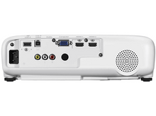 Charger l&#39;image dans la galerie, Arrière d&#39;un projecteur blanc avec divers ports : USB, HDMI, audio et un connecteur d&#39;alimentation, plus un haut-parleur.
