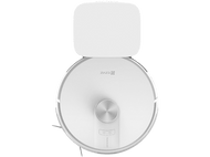 Un aspirateur robot rond blanc avec une station de charge blanche derrière. Vue de dessus.