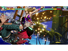 Charger l&#39;image dans la galerie, Écran de jeu de combat avec deux personnages. L&#39;une est blonde en violet, l&#39;autre est un homme chauve.
