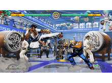 Charger l&#39;image dans la galerie, Jeu vidéo avec deux hommes se battant dans un ring avec une foule.
