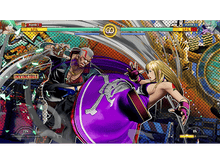 Charger l&#39;image dans la galerie, Deux personnages de jeu de combat en action, avec des effets.
