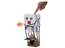Charger l&#39;image dans la galerie, Une main pointe vers un jouet Minecraft Ghast dans une montgolfière.
