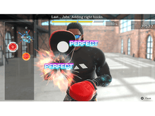 Charger l'image dans la galerie, Une personne pratiquant la boxe dans un jeu vidéo, avec le texte 'parfait' affiché.
