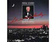 Pochette d'album de Frank Sinatra. Il sourit. Lumières de la ville en arrière-plan.