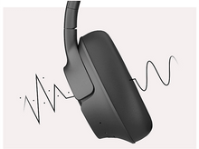 Charger l&#39;image dans la galerie, Casque noir. Des ondes sonores sont dessinées près de l&#39;écouteur.
