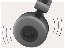 Charger l&#39;image dans la galerie, Un gros plan d&#39;un casque gris montre un logo et des ondes sonores qui émettent.
