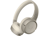 Une paire d'écouteurs sans fil beiges sur fond noir.